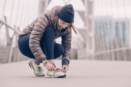 Female Athlete getting ready to do her daily morning run